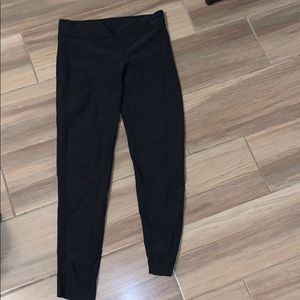 Solid black nike leggings. Lg but fits like a med